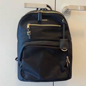 Tumi Black and Gold Women's Backpack